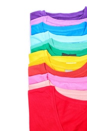 Photo of Colorful collection of t-shirts on white background