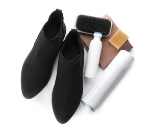 Stylish footwear and shoe care accessories on white background, top view