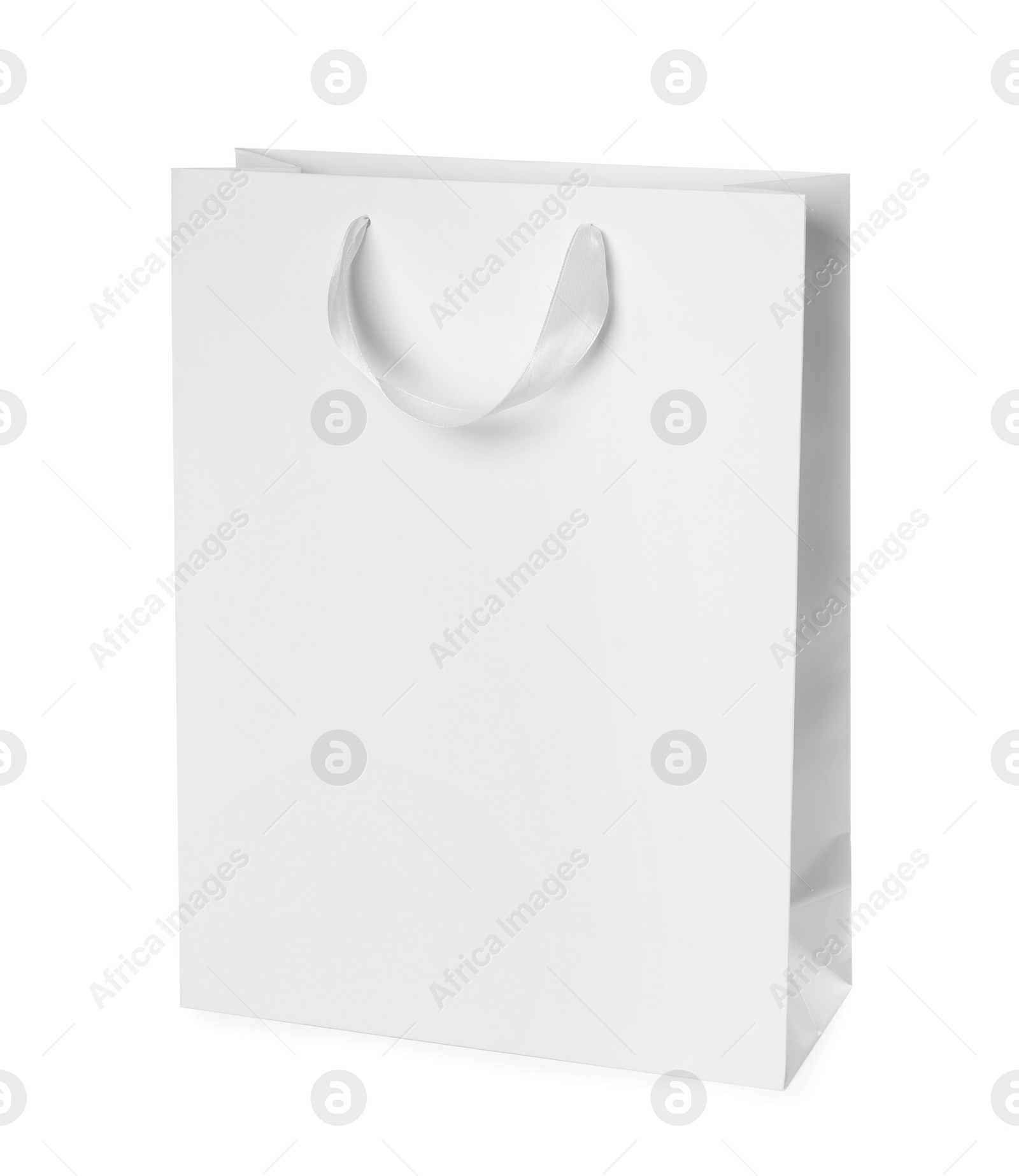 Photo of Paper shopping bag isolated on white. Mock up for design