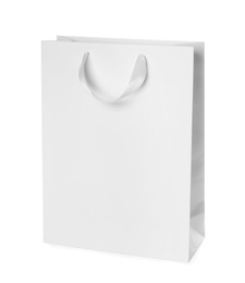 Photo of Paper shopping bag isolated on white. Mock up for design