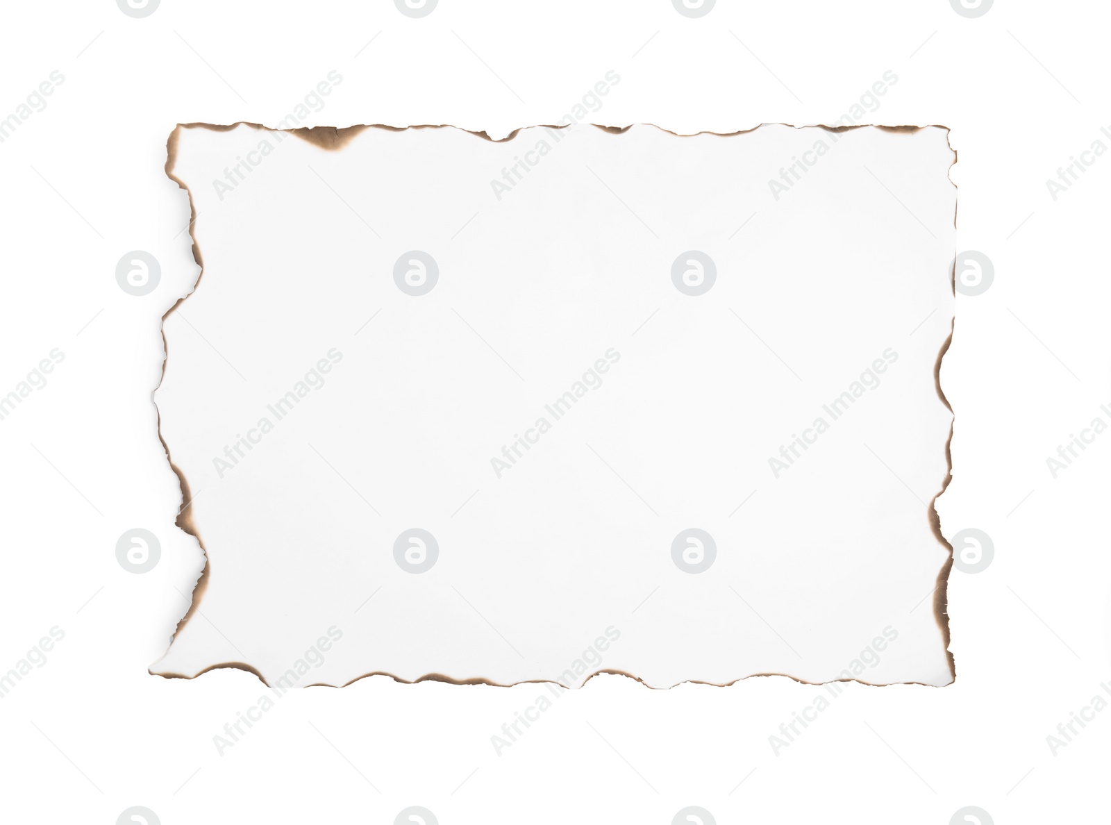 Photo of Piece of paper with dark burnt borders isolated on white, top view. Space for text