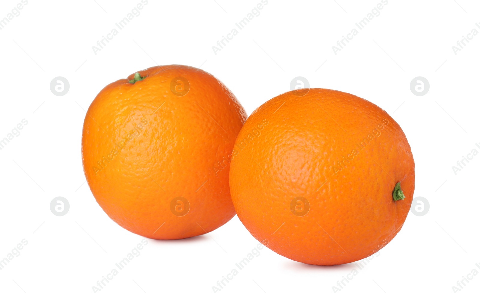 Photo of Fresh ripe oranges isolated on white. Citrus fruit