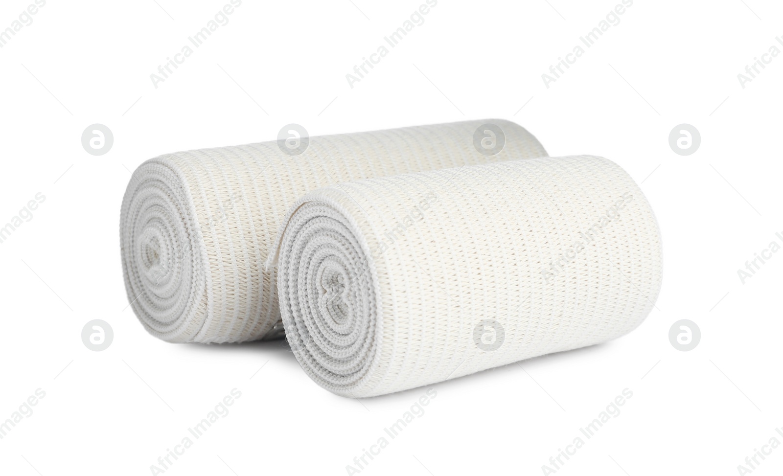 Photo of Medical bandage rolls on white background. First aid items