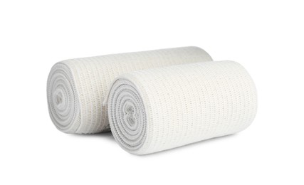 Photo of Medical bandage rolls on white background. First aid items