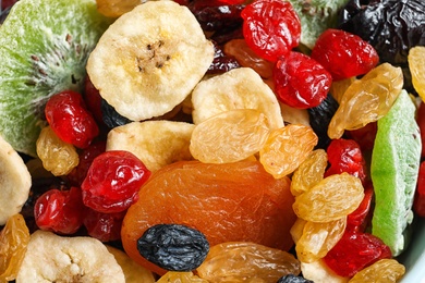 Photo of Different dried fruits as background, top view. Healthy lifestyle