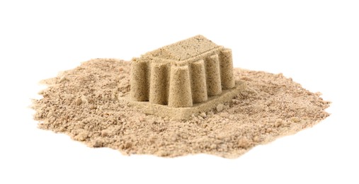 Photo of Pile of sand with beautiful castle isolated on white. Outdoor play