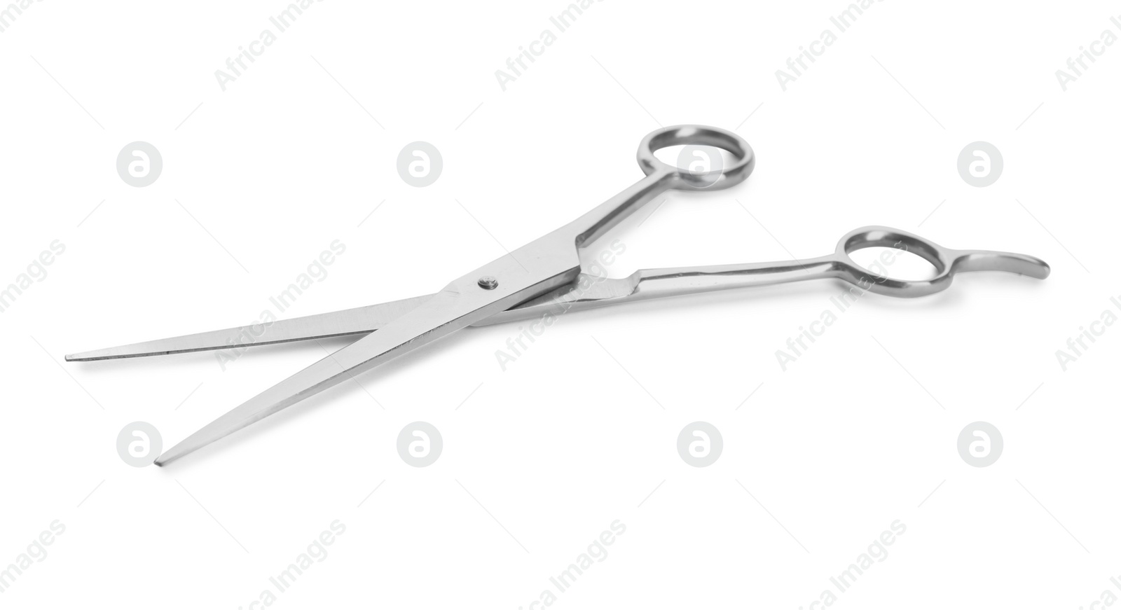 Photo of Pair of sharp hairdresser's scissors on white background