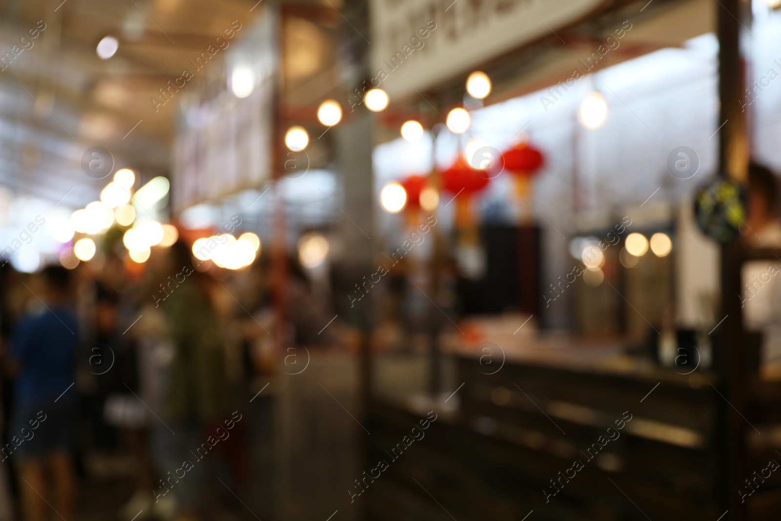 Photo of Blurred view of modern cafe. Bokeh effect