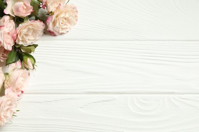 Photo of Happy Mother's Day. Beautiful flowers on white wooden table, flat lay. Space for text