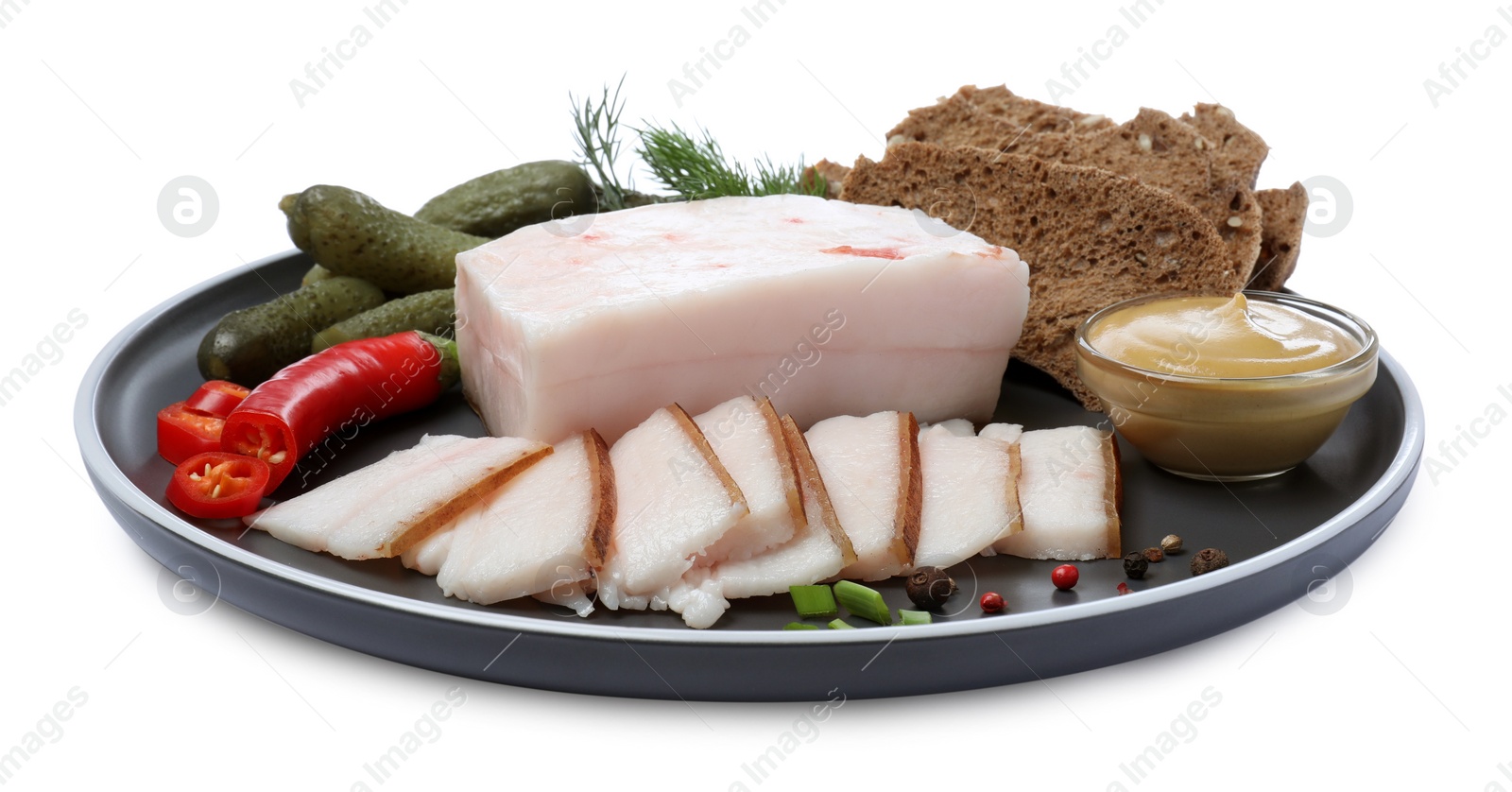 Photo of Pork fatback with spices, rye bread and pickled cucumbers isolated on white