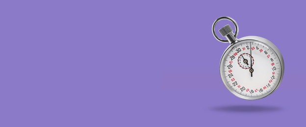 Concept of time. Vintage timer in air on violet background, banner design. Space for text