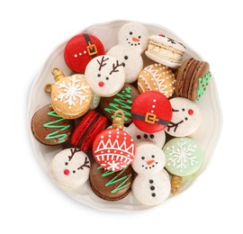 Photo of Beautifully decorated Christmas macarons on white background, top view