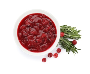 Bowl of cranberry sauce with rosemary on white background, top view