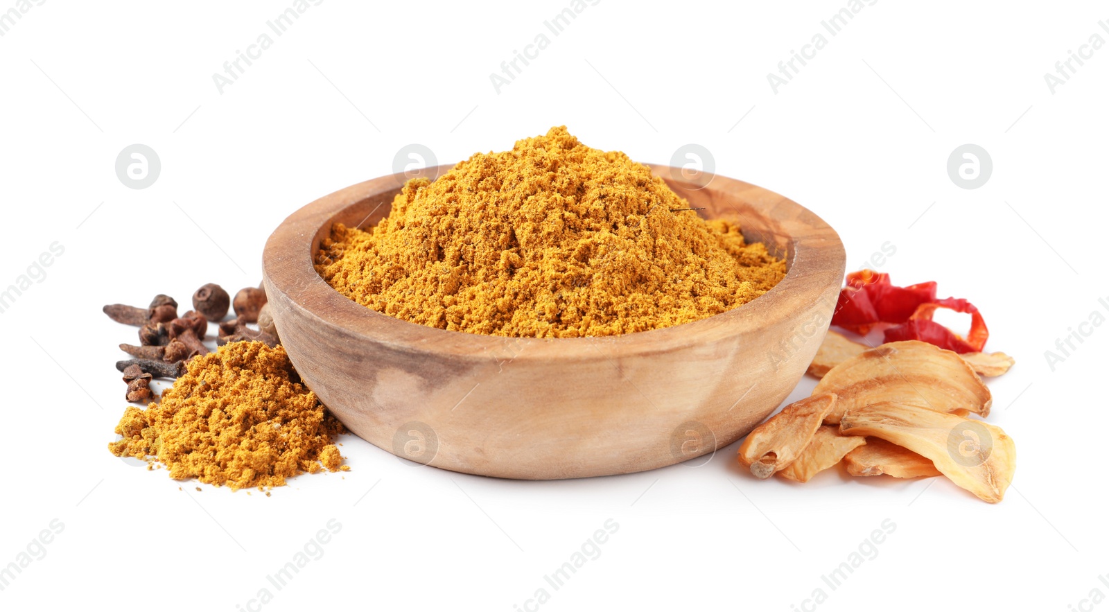 Photo of Dry curry powder in bowl and other spices isolated on white