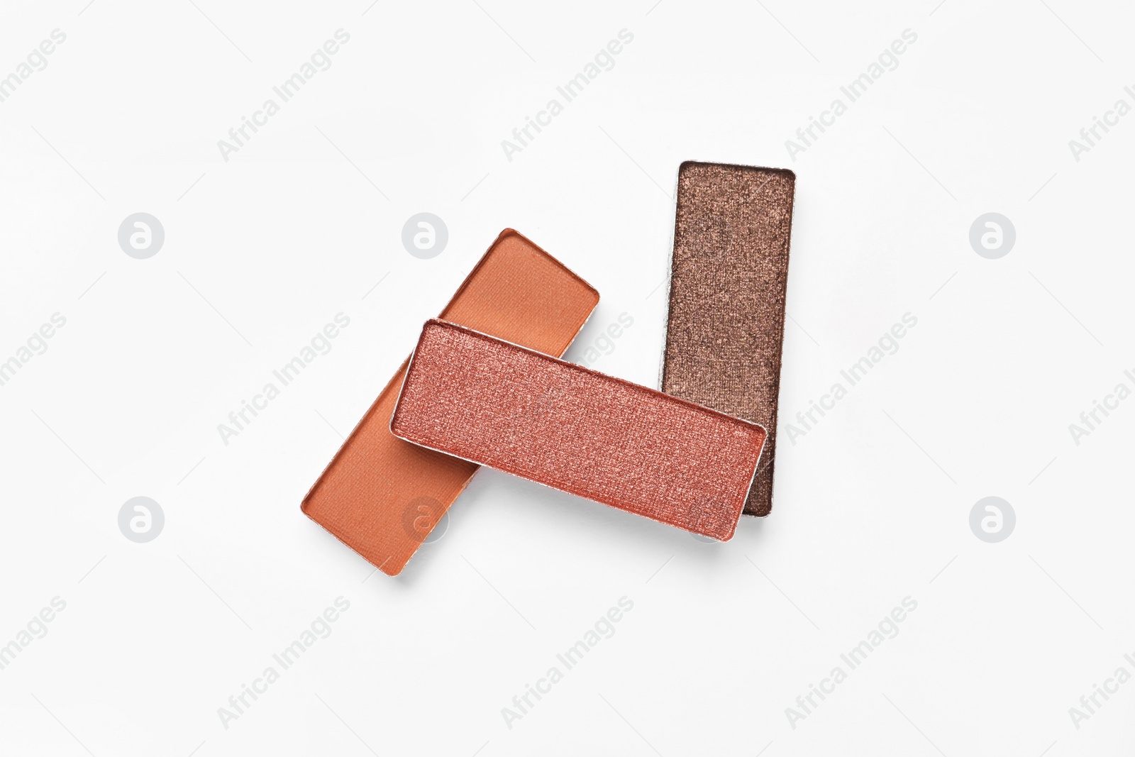 Photo of Different beautiful eye shadows on white background, flat lay