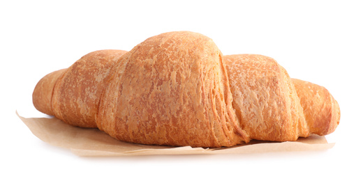 Photo of Tasty fresh crispy croissant isolated on white