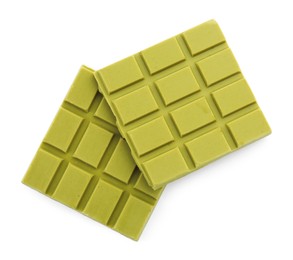 Photo of Pieces of tasty matcha chocolate bar isolated on white, top view