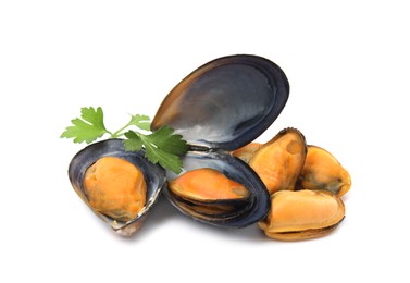 Delicious cooked mussels with parsley on white background