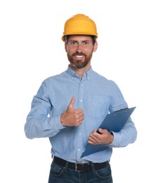Photo of Professional engineer in hard hat with clipboard showing thumb up isolated on white