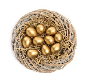 Shiny golden eggs in nest on white background, top view