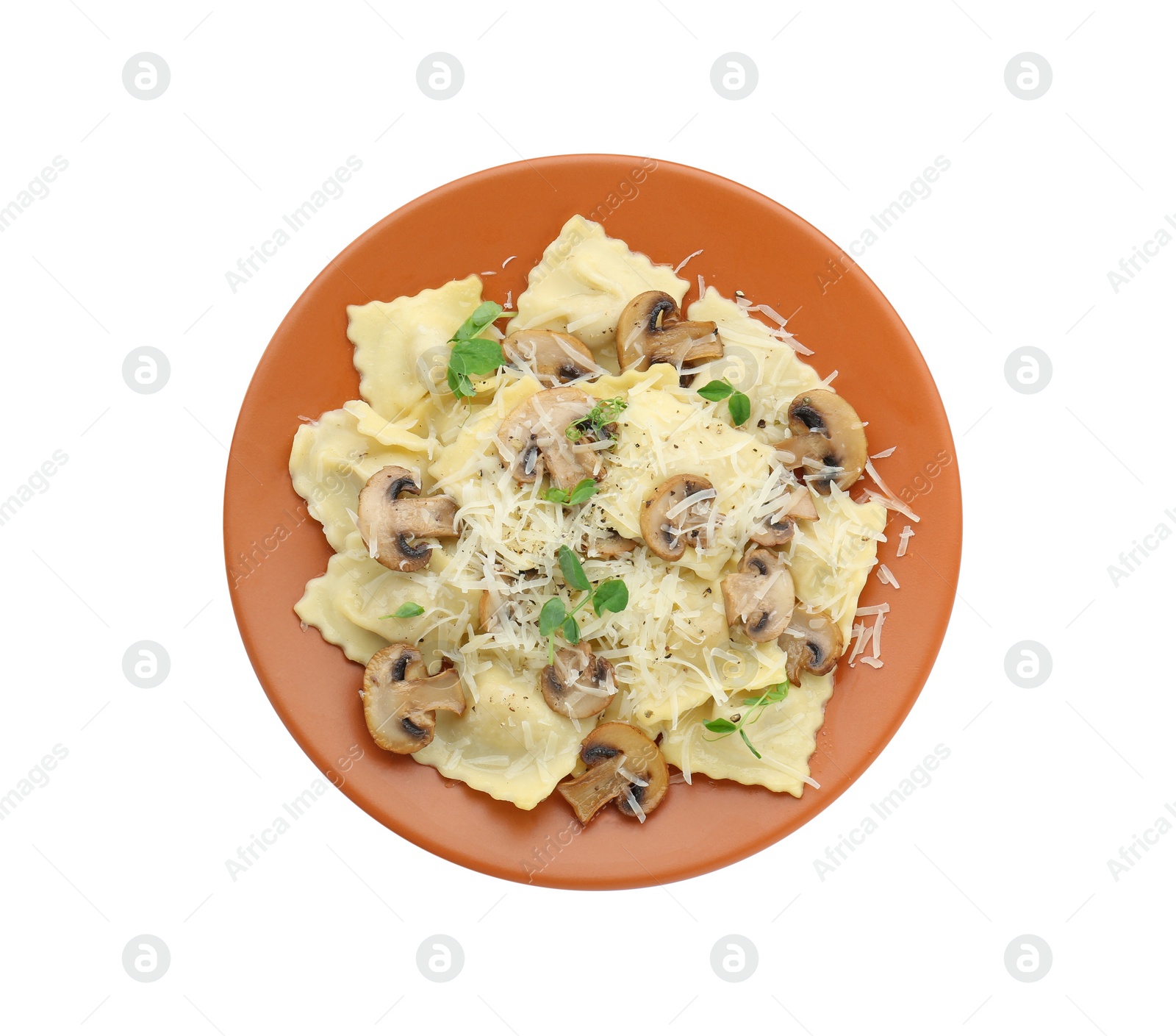 Photo of Plate of delicious ravioli with mushrooms and cheese isolated on white, top view