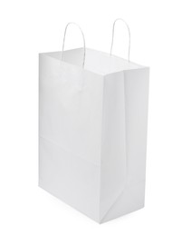 Photo of Empty shopping paper bag isolated on white