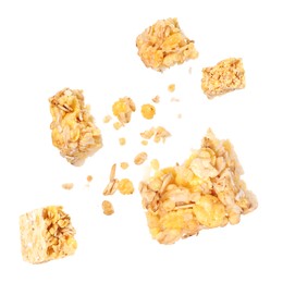 Image of Granola bar breaking in air on white background