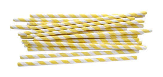 Striped paper cocktail straws on white background, top view