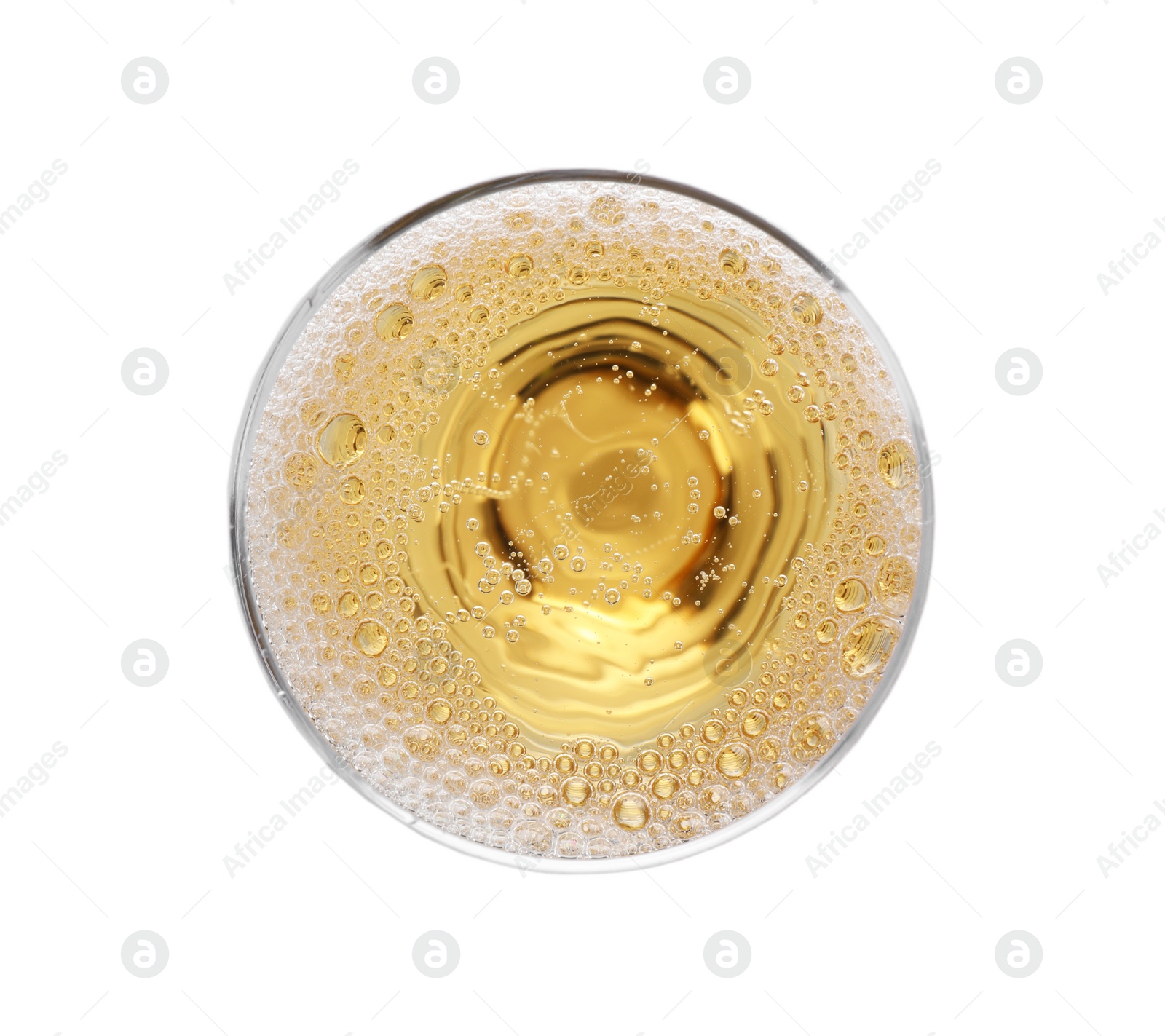 Photo of Glass of champagne on white background, top view. Festive drink