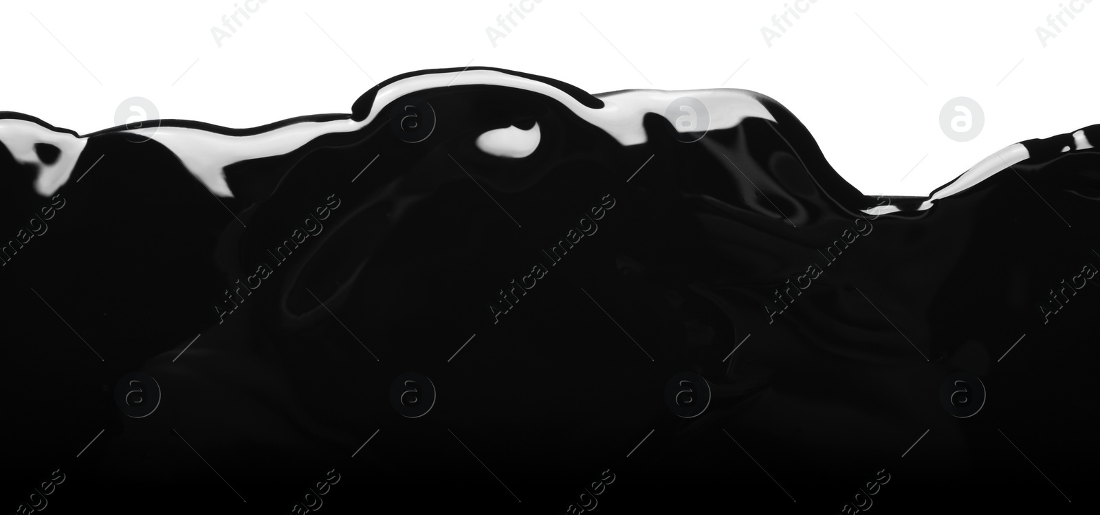 Photo of Black glossy paint spilled on white background, top view