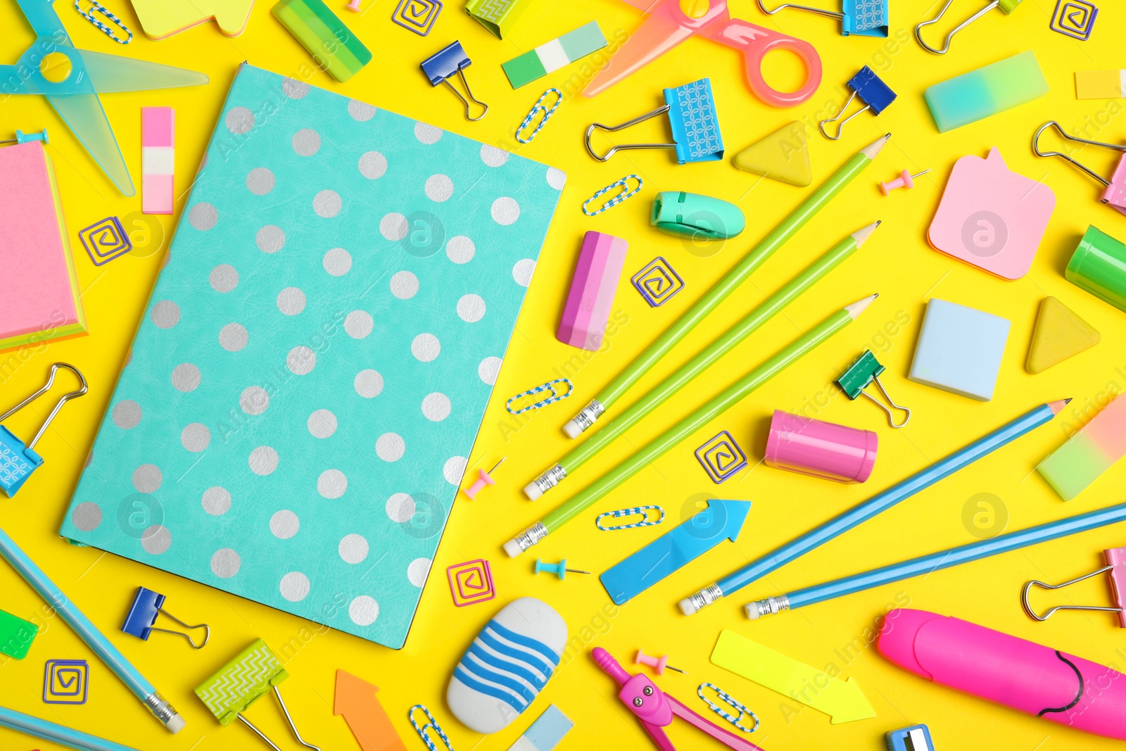 Photo of Flat lay composition with different school stationery on color background