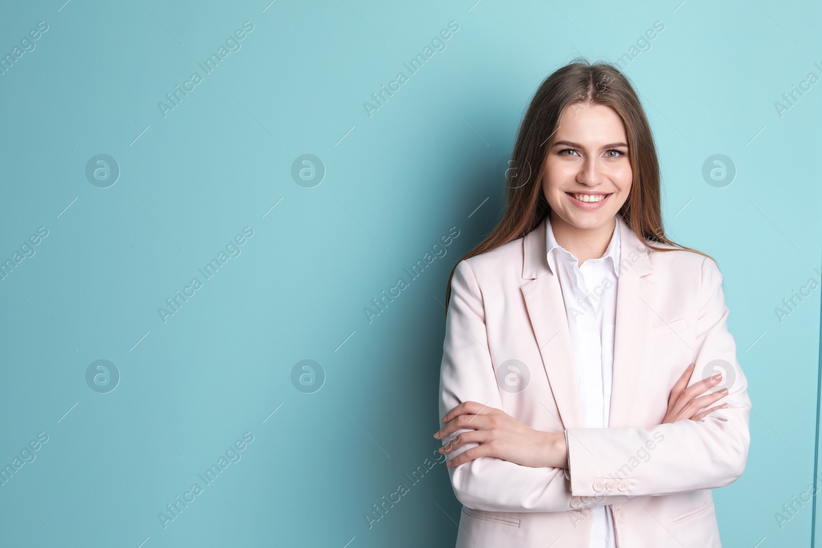 Photo of Beautiful real estate agent on color background