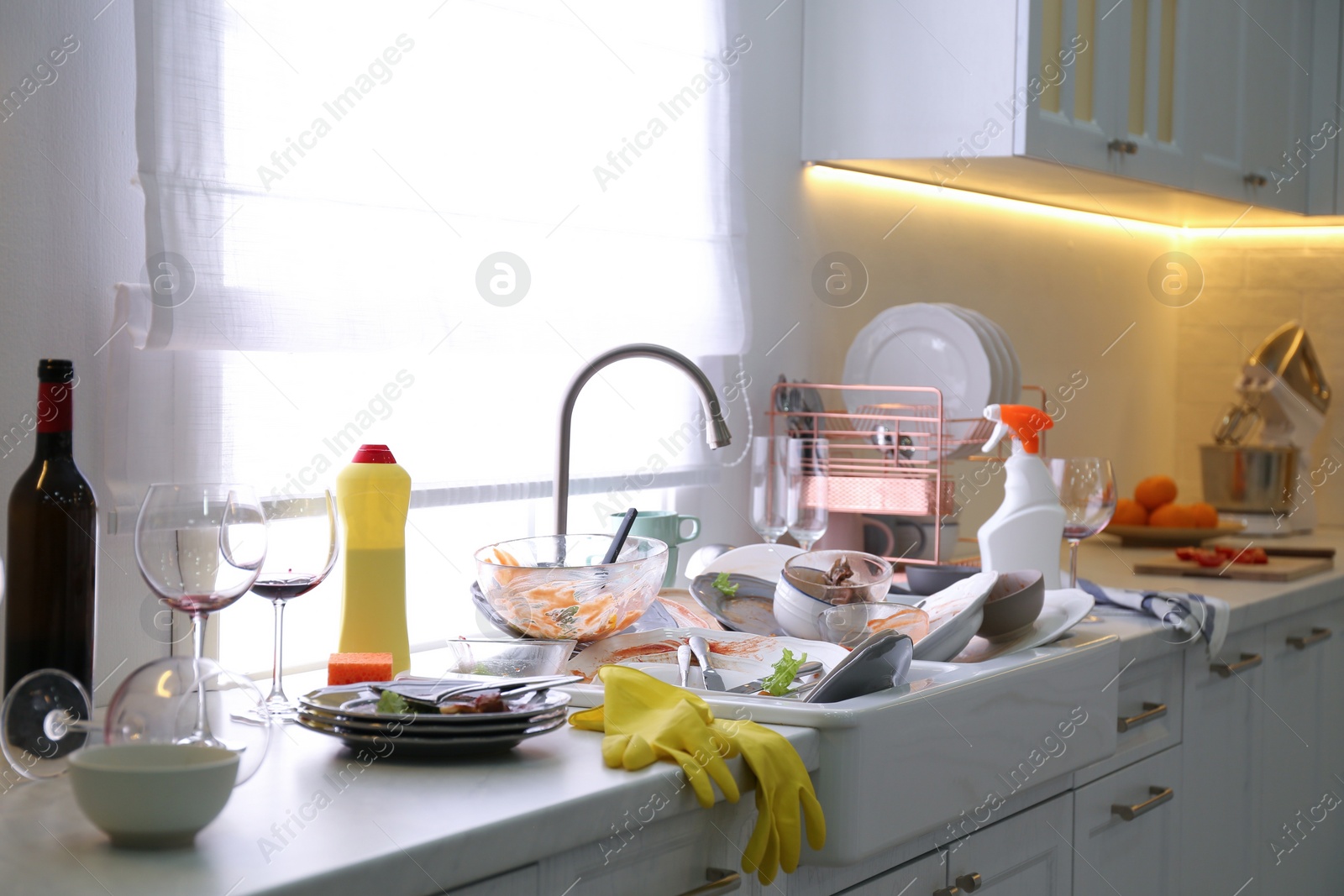 Photo of Dirty dishes in kitchen after new year party