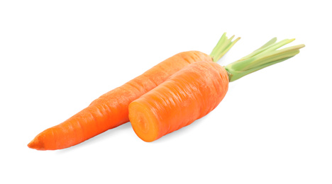 Photo of Whole and cut ripe carrots isolated on white