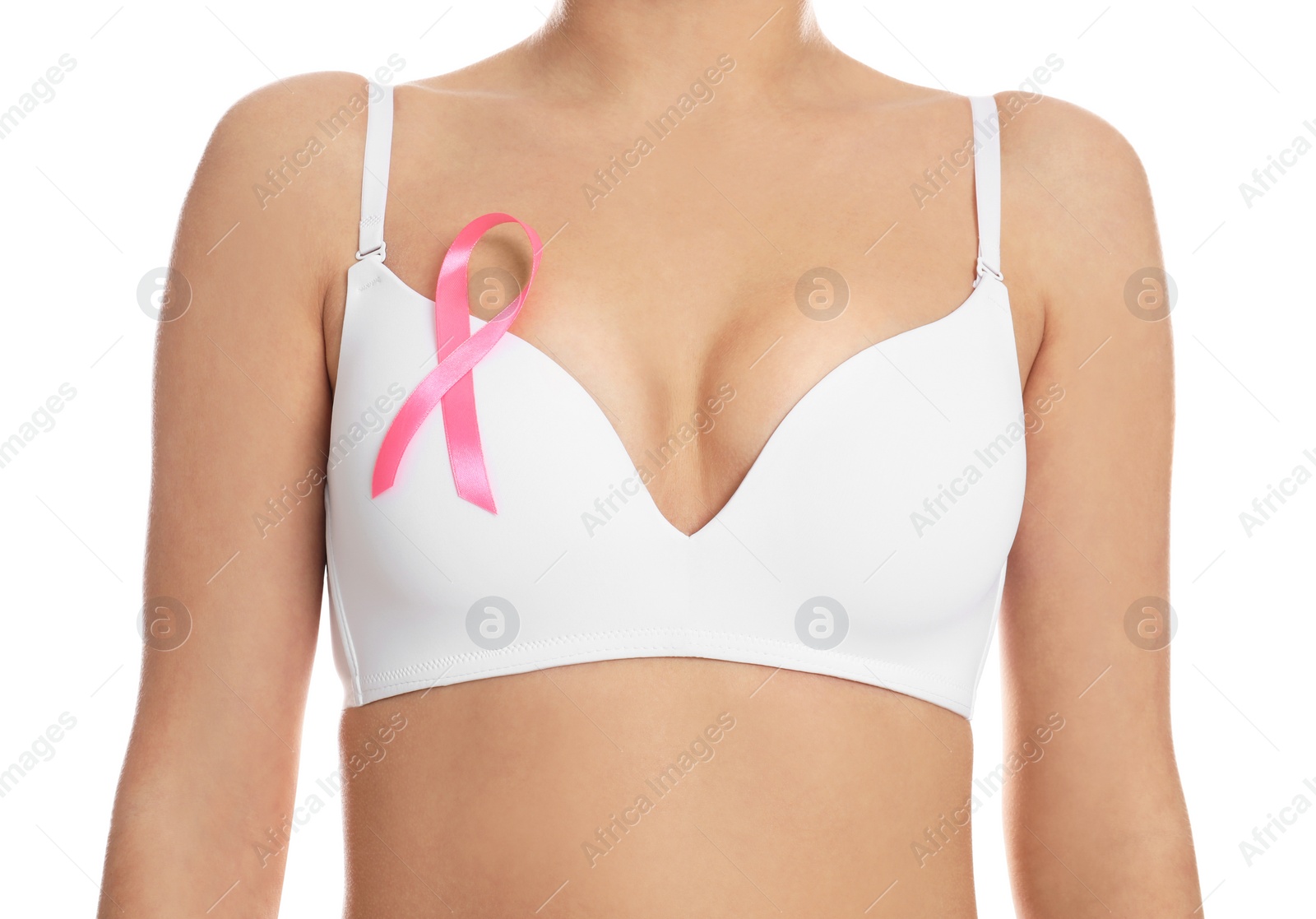 Photo of Woman with pink ribbon on white background, closeup. Breast cancer awareness