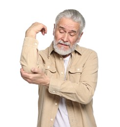 Arthritis symptoms. Man suffering from pain in elbow on white background