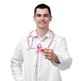 Photo of Portrait of smiling mammologist with stethoscope giving pink ribbon on white background. Breast cancer awareness