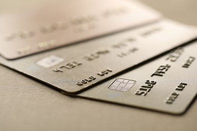 Different credit cards on table, closeup view