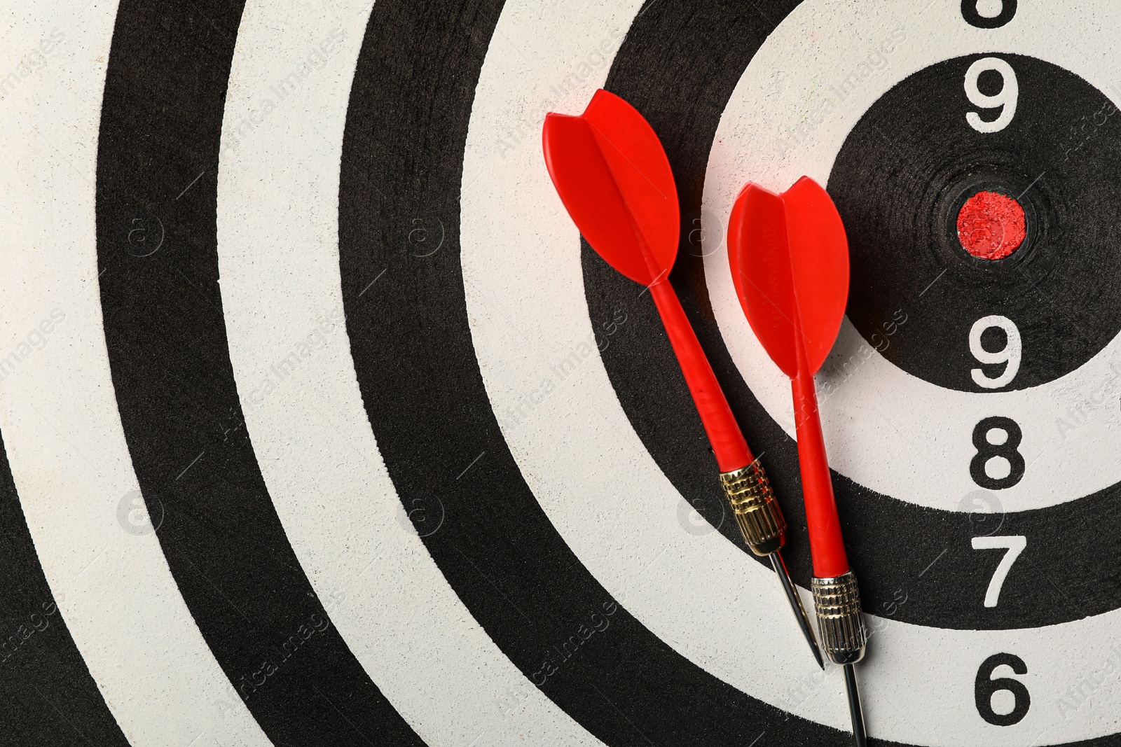 Photo of Red arrows on dart board, top view