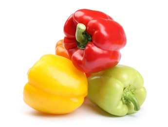 Fresh ripe bell peppers on white background