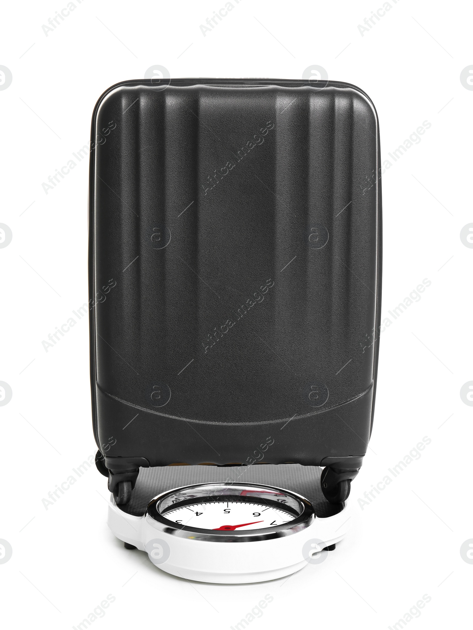 Photo of Weighing stylish suitcase on scales, white background