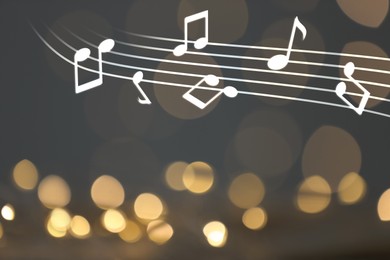 Image of Music notes on blurred background, bokeh effect