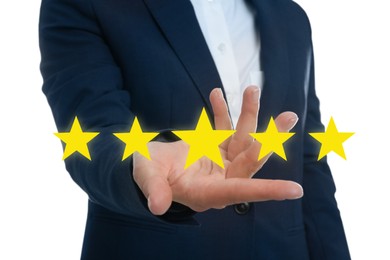 Image of Quality evaluation. Businessman showing virtual golden stars on white background, closeup