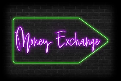 Image of Bright Money Exchange neon sign on brick wall. Arrow shaped frame with violet text