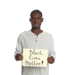 Photo of African American man holding sign with phrase Black Lives Matter on white background. Racism concept