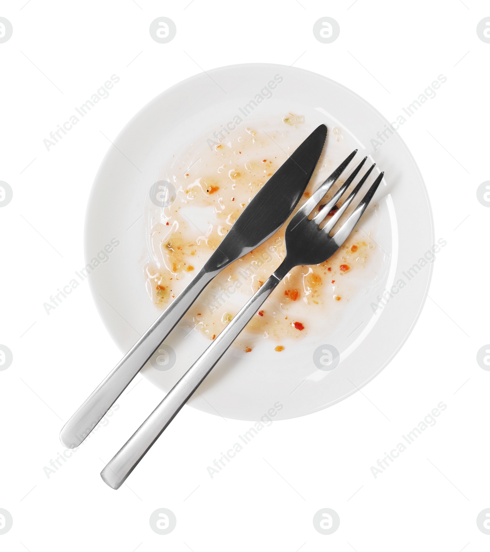 Photo of Dirty plate and cutlery on white background, top view