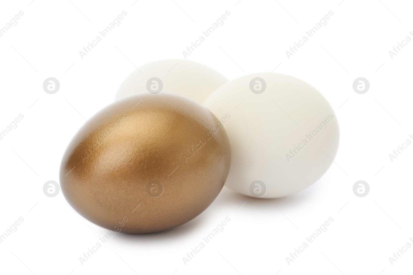 Photo of Golden egg among ordinary ones on white background