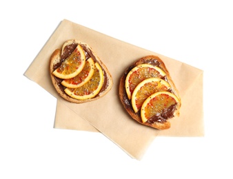 Photo of Tasty toasts with chocolate paste, orange and chia seeds on white background, top view