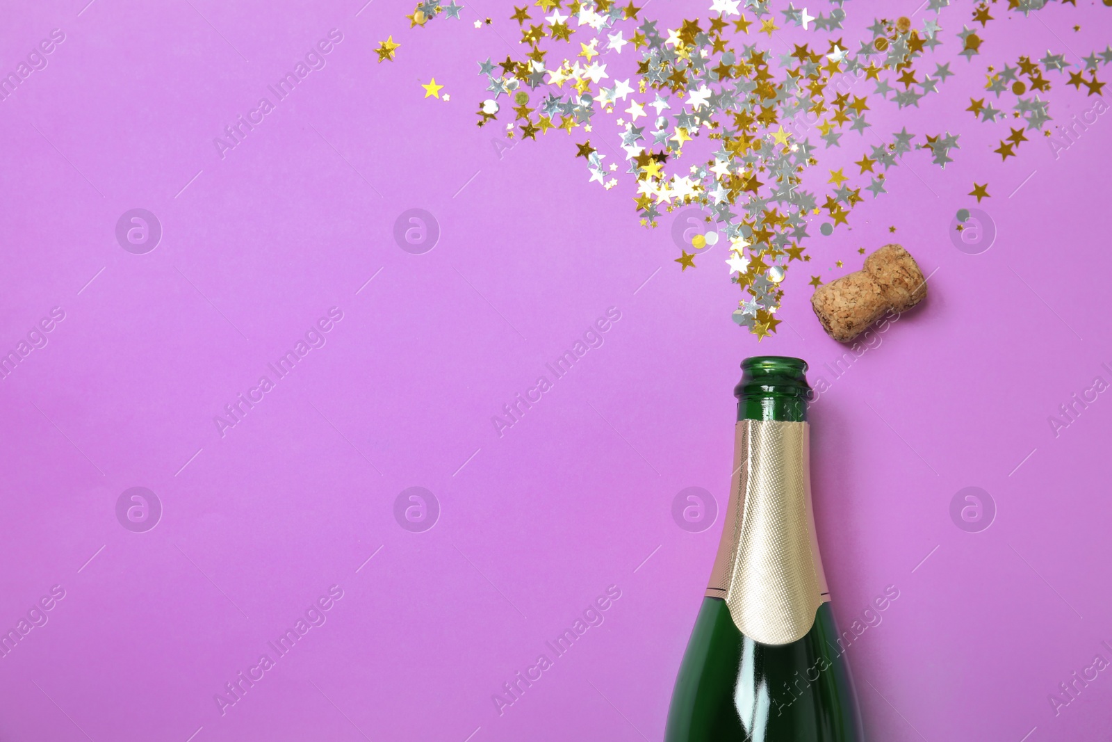 Photo of Creative flat lay composition with bottle of champagne and space for text on color background