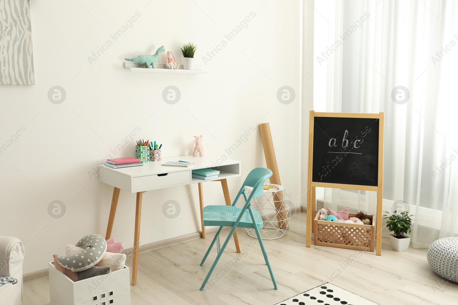 Photo of Modern child room interior with stylish furniture